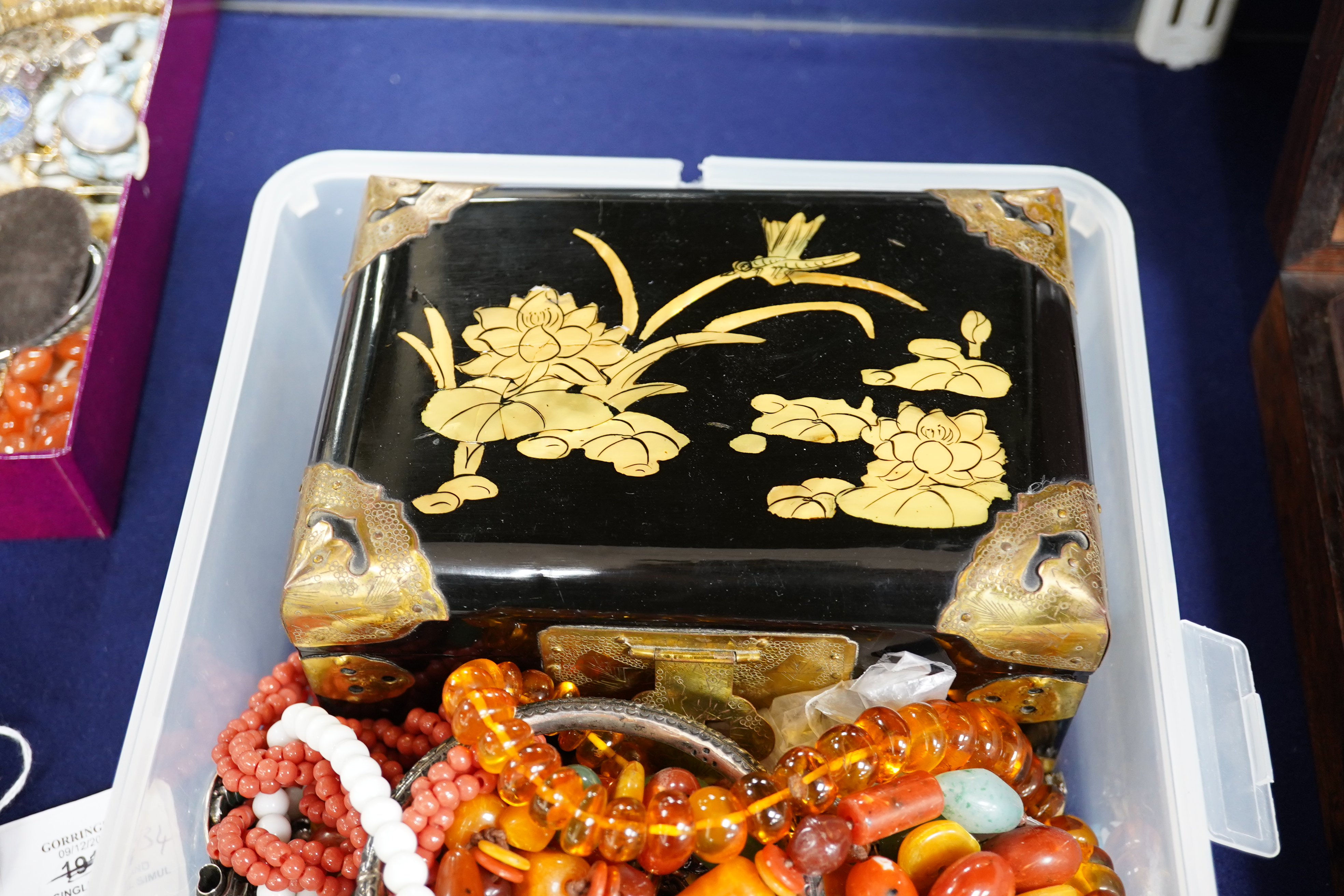 A quantity of assorted jewellery and other items including costume, amber necklace, silver ring, 925 cross pendant, lacquer box, etc. Condition - fair